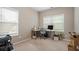 Bedroom with two windows, neutral carpet, and desk, offering a comfortable workspace at 1536 Drew Nw Dr, Atlanta, GA 30318