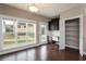 Bright home office with large windows, hardwood floors, a desk area, and an adjacent pantry at 1536 Drew Nw Dr, Atlanta, GA 30318
