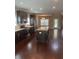Open kitchen with granite counters, stainless appliances, kitchen island and dark wood cabinets at 1536 Drew Nw Dr, Atlanta, GA 30318