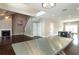 Open floor plan with hardwood floors connecting the living room, dining area, and kitchen at 1536 Drew Nw Dr, Atlanta, GA 30318