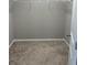 Empty walk-in closet showing carpeted floor and white shelving at 1536 Drew Nw Dr, Atlanta, GA 30318