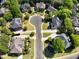 Aerial view of the neighborhood showcasing tree-lined streets and well-maintained homes at 605 Tatum Ct, Alpharetta, GA 30022