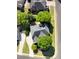 An aerial shot shows the home, mature trees and landscaping and driveway at 605 Tatum Ct, Alpharetta, GA 30022