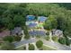 An aerial view of the community featuring tennis courts, pool and clubhouse at 605 Tatum Ct, Alpharetta, GA 30022
