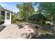 Stone backyard patio perfect for outdoor seating and enjoying the view at 605 Tatum Ct, Alpharetta, GA 30022