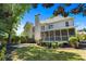 Spacious backyard with a screened porch, ideal for outdoor relaxation and entertaining at 605 Tatum Ct, Alpharetta, GA 30022