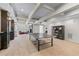 Finished basement featuring a ping pong table, lounge area, and decorative lighting at 605 Tatum Ct, Alpharetta, GA 30022