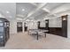 Finished basement with recreation area and a wet bar perfect for entertaining Gathering and friends at 605 Tatum Ct, Alpharetta, GA 30022