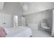 Bright bedroom with hanging chair, neutral walls, and ample closet space at 605 Tatum Ct, Alpharetta, GA 30022