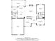 First floor plan featuring a kitchen, great room, breakfast nook, and dining room at 605 Tatum Ct, Alpharetta, GA 30022