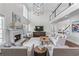 Inviting living room with a fireplace, high ceilings, and an open-concept design at 605 Tatum Ct, Alpharetta, GA 30022