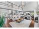 Open floor plan with living room, kitchen, dining room and staircase at 605 Tatum Ct, Alpharetta, GA 30022