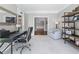 Serene home office features a desk, chair, and bookcase, bathed in natural light from windows at 605 Tatum Ct, Alpharetta, GA 30022