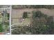 Aerial view of a property showing the home, outbuildings, and surrounding land at 1277 Bethany Rd, Covington, GA 30016