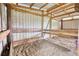 Image of a barn stall with wooden plank walls at 1277 Bethany Rd, Covington, GA 30016
