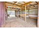 View of barn interior displaying open stalls and colorful ribbons at 1277 Bethany Rd, Covington, GA 30016