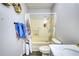 Bathroom featuring shower-tub combo with curtain, toilet, and vanity sink with shelves at 1277 Bethany Rd, Covington, GA 30016