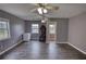 Spacious bedroom with hardwood floors, ceiling fans, and natural light at 1277 Bethany Rd, Covington, GA 30016