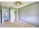 Neutral bedroom with carpet, closet, and neutral paint, creating a simple backdrop at 1277 Bethany Rd, Covington, GA 30016