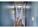 The hallway offers a view of doors leading to different rooms, creating an inviting path through the home at 1277 Bethany Rd, Covington, GA 30016