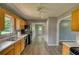 The kitchen shows an oven, wood cabinets, modern appliances, and seamless flow into other living areas at 1277 Bethany Rd, Covington, GA 30016
