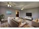 Staged living room with modern furniture, laminate floors, and neutral walls, creating a cozy and inviting space at 1277 Bethany Rd, Covington, GA 30016