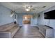 This living room features wood-look floors, comfortable seating, and an open design at 1277 Bethany Rd, Covington, GA 30016