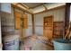 Interior of a shed features shelving, storage units, and ample space for various tools and equipment at 1277 Bethany Rd, Covington, GA 30016