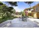 Beautiful backyard with a wooden deck and outdoor seating area surrounded by lush greenery at 3025 Greenfield Dr, Marietta, GA 30068