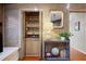 The living room features a built in bar with wine storage and shelving at 3025 Greenfield Dr, Marietta, GA 30068