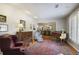 Inviting living room showcases hardwood floors, decorative furnishings, and seamless access to the dining area at 3025 Greenfield Dr, Marietta, GA 30068