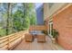 Inviting back deck featuring an outdoor seating area perfect for relaxation and entertaining at 1038 Huntcliff, Atlanta, GA 30350