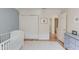 Bedroom room with hardwood floors, white walls, and a large closet space at 1038 Huntcliff, Atlanta, GA 30350