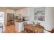 Kitchen and breakfast area featuring white cabinets and stainless steel appliances at 1038 Huntcliff, Atlanta, GA 30350