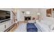 Cozy living room featuring a fireplace, hardwood floors, comfortable seating, and stylish decor at 1038 Huntcliff, Atlanta, GA 30350