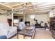 Finished basement featuring an exercise area, seating, wine rack and stylish coffee table at 1295 Lindenwood Ne Ln, Brookhaven, GA 30319