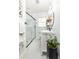 Modern bathroom featuring a glass-enclosed shower and vanity at 1295 Lindenwood Ne Ln, Brookhaven, GA 30319