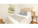 Bright bedroom with natural light from the large window at 1295 Lindenwood Ne Ln, Brookhaven, GA 30319