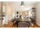 Bright dining area with hardwood floors connecting living spaces at 1295 Lindenwood Ne Ln, Brookhaven, GA 30319