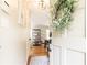 Welcoming entryway with hardwood floors, showcasing a glimpse into the dining area at 1295 Lindenwood Ne Ln, Brookhaven, GA 30319