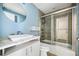 Stylish bathroom featuring a modern vanity, unique mirror, and shower over tub at 145 15Th Ne St # 435, Atlanta, GA 30309