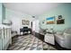 Adorable Bedroom with a crib, piano, and a comfortable chair for relaxing at 145 15Th Ne St # 435, Atlanta, GA 30309