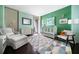 Well-decorated Bedroom with a crib, dresser, rocking chair, and modern design at 145 15Th Ne St # 435, Atlanta, GA 30309