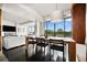 Open floor plan with dining room table and chairs adjacent to living room and great views at 145 15Th Ne St # 435, Atlanta, GA 30309