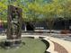 Artistic fountain featuring sculpture in front of a building with trees and landscaping at 145 15Th Ne St # 435, Atlanta, GA 30309