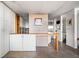 Open kitchen floor plan with large island, stainless steel appliances and stone flooring at 145 15Th Ne St # 435, Atlanta, GA 30309
