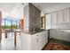 Well-appointed kitchen with large windows, marble countertops and stainless steel appliances at 145 15Th Ne St # 435, Atlanta, GA 30309