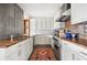 Modern kitchen features stainless steel appliances, granite countertops, and plenty of cabinet space at 145 15Th Ne St # 435, Atlanta, GA 30309