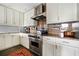 Modern kitchen featuring stainless steel appliances, custom cabinetry, and ample counter space at 145 15Th Ne St # 435, Atlanta, GA 30309