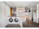 Convenient laundry room with stacked washer and dryer adjacent to the kitchen area at 145 15Th Ne St # 435, Atlanta, GA 30309